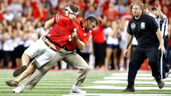 SportsCenter's tweet photo. ICYMI: Former Ohio St LB and current strength coach Anthony Schlegel LAID OUT a fan today. Here's photo evidence. http://t.co/Gbrt3J3Y02