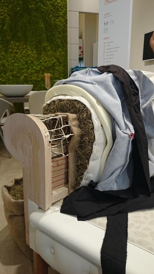 DomusWeb's tweet image. A craftman showed us how the #Chester sofa looks like under the superficial layer @poltronafrau #viennadesignweek