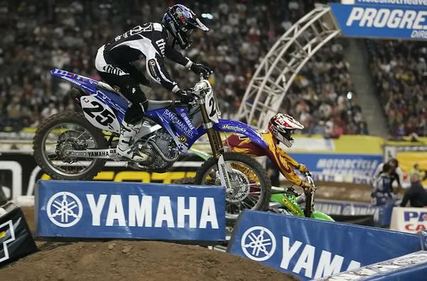 Here leading and fighting with the AMA Supercross Champion Nathan Ramsey to win the LCQ in Houston.