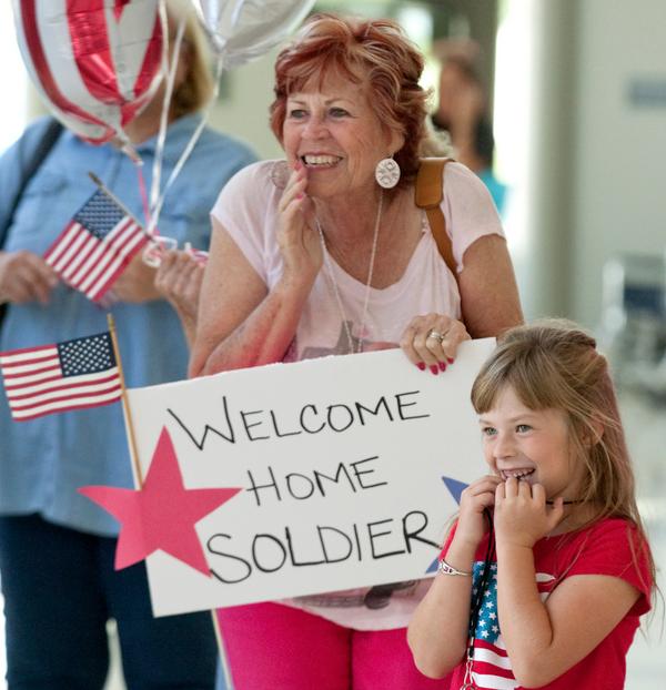 andytempletonph's tweet photo. I was at the Ontario Airport Friday to shoot some interior photos. And then this happened.
Welcome home Sgt. Swick! http://t.co/dvia7j1kyW