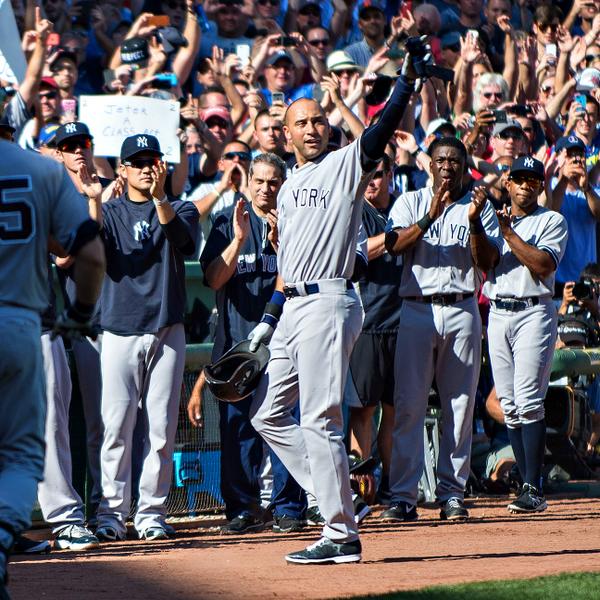 SportsCenter's tweet photo. Photo of the Day: Derek Jeter waves goodbye as he exits the field for final time. (picture via @robtringali) http://t.co/qpMLJwAqc5