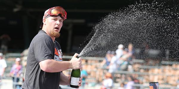 MLB's tweet image. The @Tigers have that celebrating-the-AL-Central-crown thing down pat. #Game162