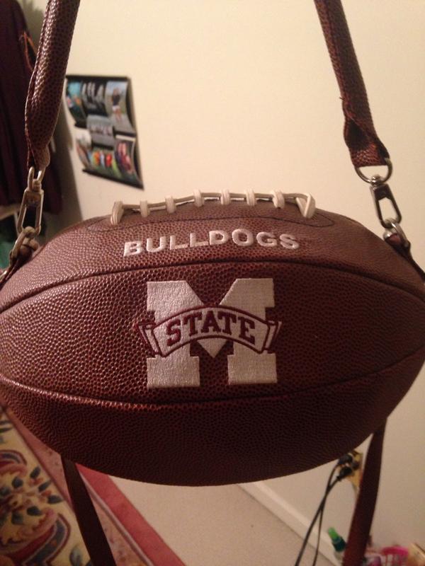 skmillican's tweet photo. “@caseyb_ferguson: Should I bring my football purse back to starkville y/n? http://t.co/0qvGn8uogC” please do!