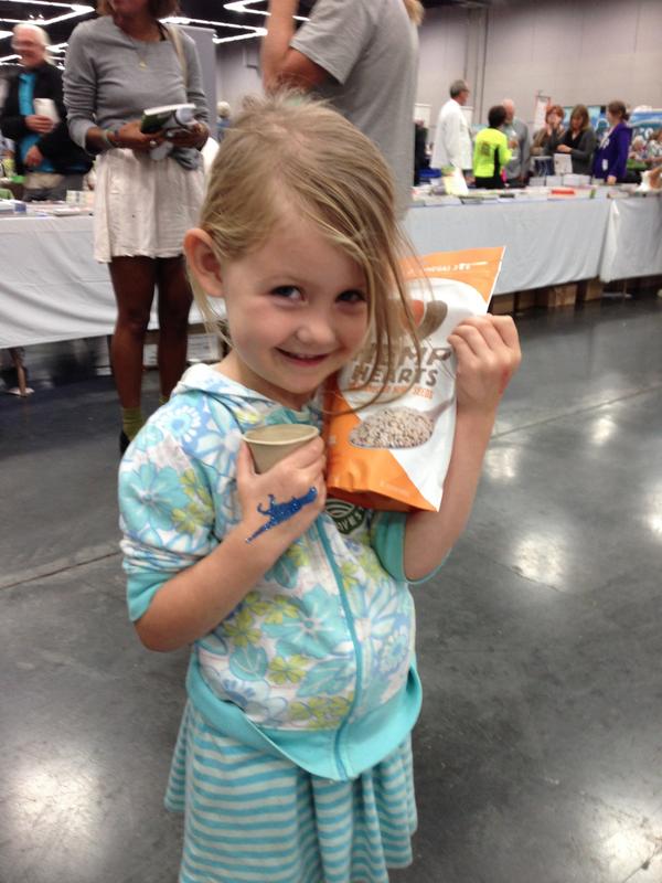 manitobaharvest's tweet photo. Lifelong fan in the making caught red handed at @NorthwestVEG (aka #Portland Vegfest). We love this pic! #bettersnack http://t.co/LXNW7NBYz3