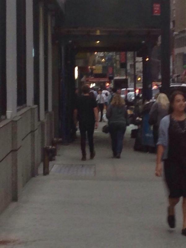 boyfriendluke's tweet image. ashton and liz walking around nyc a few minutes ago (via @cliffordssmile)