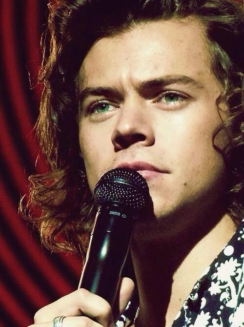 Piercing green eyes.