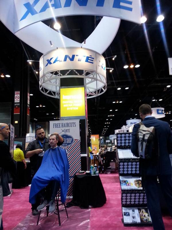 KashifM's tweet image. Free haircuts at a booth. Now that&apos;s something you don&apos;t see every day #graphexpo2014 #xante