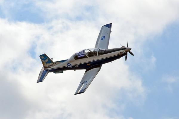 KGrapsas's tweet photo. The #HAForce demo T-6A "weaving" the #Greek flag during the  #AthensFlyingWeek show #photo  #Greece http://t.co/1eudEUHdeD