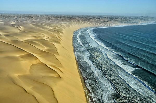 awkwardgoogle's tweet image. Where the Namib Desert meets the Atlantic Ocean