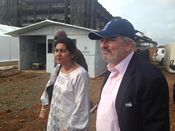 UNDP's tweet photo. .@UNDP officials witnessing construction of #Ebola treatmt ctr. Complex job 2 keep patients serviced and wkers safe. http://t.co/9E6hI4JiiP