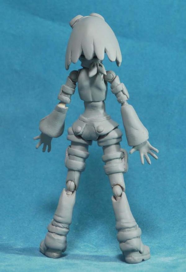 It's an unpainted, rough Aero figure photographed from behind.  Snazzy, but it could use sanding and smoothing over.