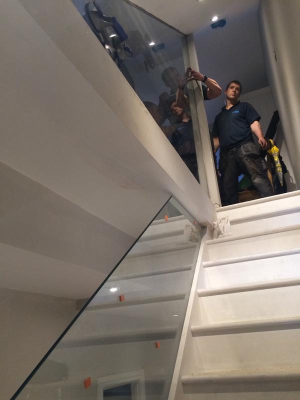 TheLCCLtd's tweet photo. Glass balustrades being installed. #basementpros #creatingthefinest #basementbuilders http://t.co/880HWYZcOY