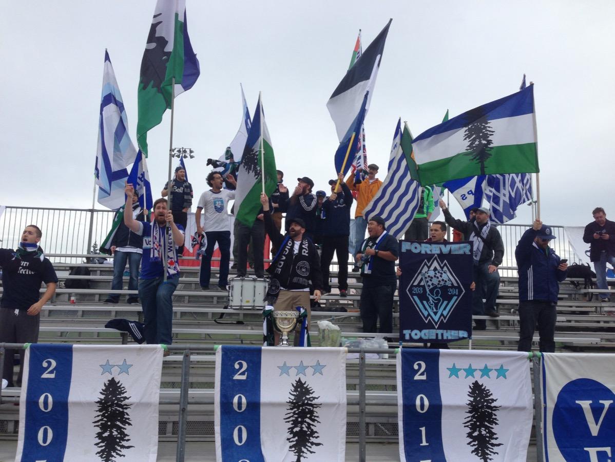 in the stands. Team and supporters sing Happy Birthday to Carl Robinson. 