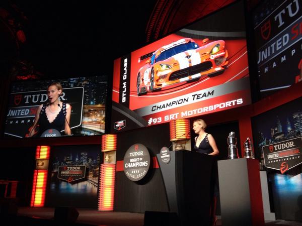 .<a href="/BethParetta/">Beth Paretta</a> accepts the <a href="/UnitedSportsCar/">Please Follow @IMSA</a> GTLM team championship for #TeamSRT and the No 93 #Viper