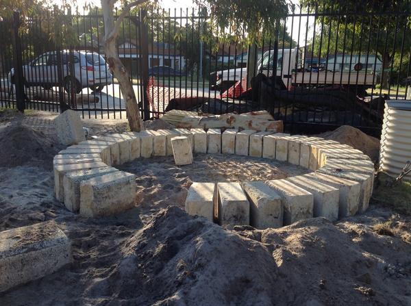 #SCnatureplayground Day 15: the bridge and fire pit are being constructed.
The water tray has been added.