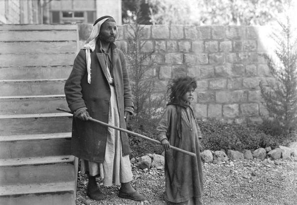 AsmaaAbdalla_'s tweet photo. A girl leads her blind grandfther. #Tabariya #Palestine in 1934 #History_of_Palestine http://t.co/JOGtlzadf1