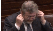 thejournal_ie's tweet photo. What is James Reilly listening to? (Because it isn't @RBoydBarrett) Look: http://t.co/TD0URrtuk1 http://t.co/C0n4ufu1dX