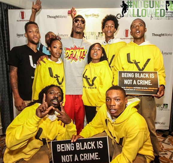 handsupunited_'s tweet photo. "Being Black Is Not A Crime" w @SnoopDogg and @lostvoices14 during #BETHipHopAwards http://t.co/20cZwKnuIW #Ferguson http://t.co/8MyJAC9zNG