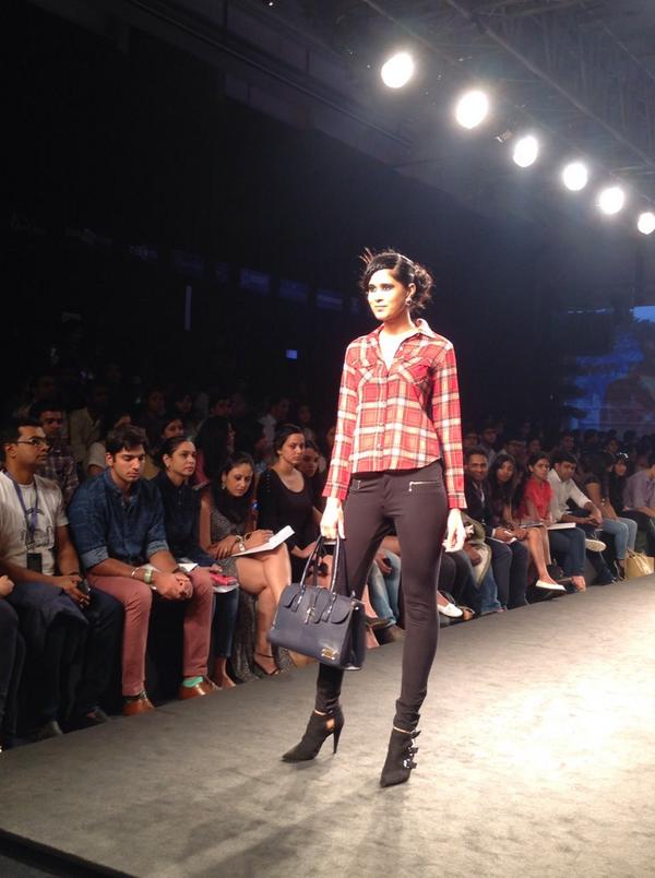 priyaadivarekar's tweet image. Plaids, reds and lots of A/W colours, with floral, fabrics like faux leather at the @ElleFashionwear show #MFWKnd
