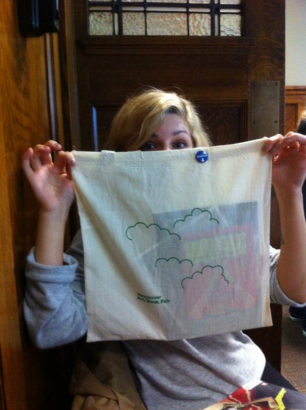 JackPinePress's tweet photo. the #VABF2014 is yet again busy busy busy! Also fun: tote bags for everyone! Here, we present "babe with tote" http://t.co/uoHVQjYAPk