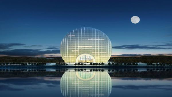 MartinShapiro's tweet photo. Designed to look like a rising sun, Sunrise Kempinski Hotel in Beijing is covered in 10,000 glass panels http://t.co/jbGpBQXRCj