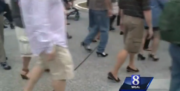 Cosmopolitan's tweet photo. Men walk a mile in heels to raise awareness for a very important cause: http://t.co/hYxt6KyA2s http://t.co/0lvZcqCp3L