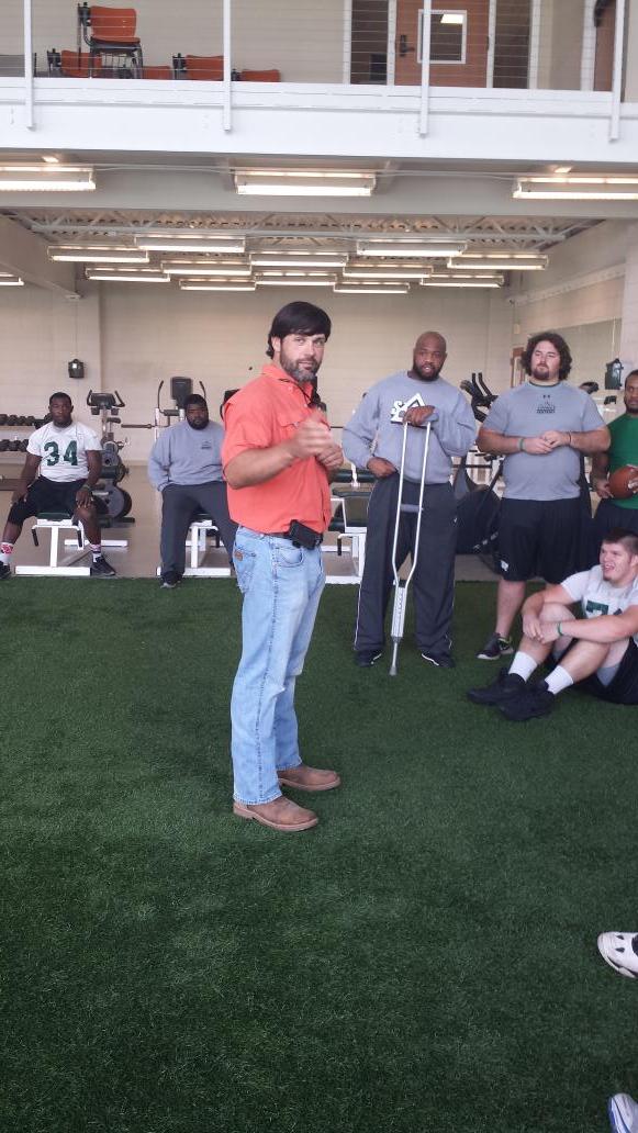DSUStatesmen's tweet photo. Three time All-American OL Chris Booker talks to the DSU OL prior to Monday's practice.  Welcome back Chris! http://t.co/1sbqpycWkj