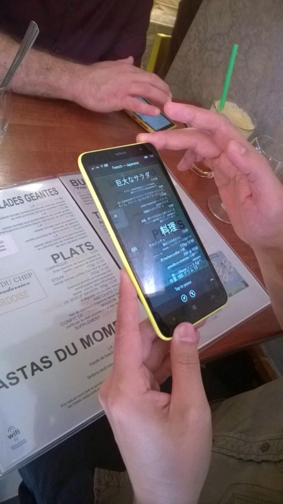 mtsewing's tweet photo. Tech Change in Real life: @shin135 Reading a french Menu With his Phone in Paris http://t.co/yfQaHqLR7W