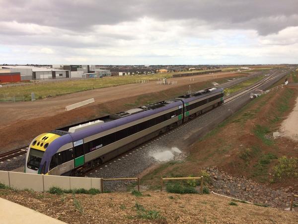 rrlproject's tweet photo. Another test train has made its way along the new tracks today (here passing under the Greens Road grade separation) http://t.co/TZKeDPDwDG