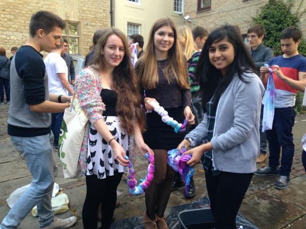 The Freshers' Committee are welcoming new students by dip dying t-shirts in Holywell Quad #WelcomeToHertford