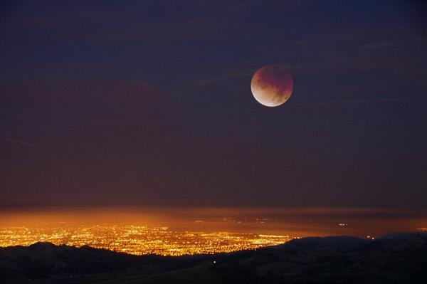 NASA's tweet photo. Still awake? Lunar Eclipse from 4am ET - sunrise. We're up now answering your questions: http://t.co/OeQaI8kWGA http://t.co/iqCWlRTYi2