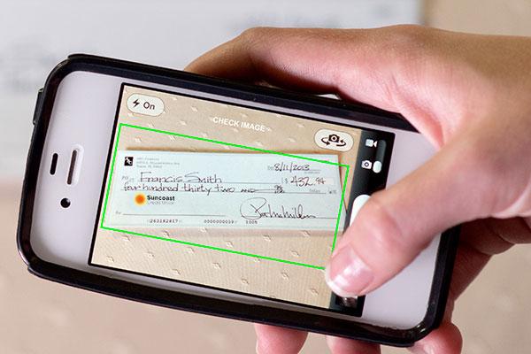 SuncoastCU's tweet photo. On #SunMobile you can deposit checks by taking a pic on your phone. Have you tried this feature yet? http://t.co/tFQgWjzTTw