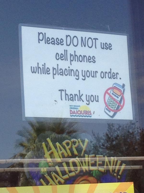jonclearymusic's tweet photo. Sign at the drive thru daiquiri bar in New Orleans . They've got their priorities right http://t.co/Nl5nFEeJ1l