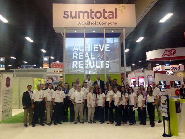 Melynda_H's tweet image. Look at these smiling faces at @SumTotalSystems booth! Achieving results in the #LearningAge @Skillsoft #HRTechConf