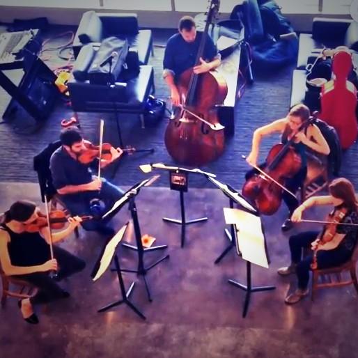 GeorgiaTech's tweet photo. Flash concert in @GTClough. String quintet playing @ledzeppelin and @radiohead covers. #OnlyAtTech http://t.co/7hryDe37Td