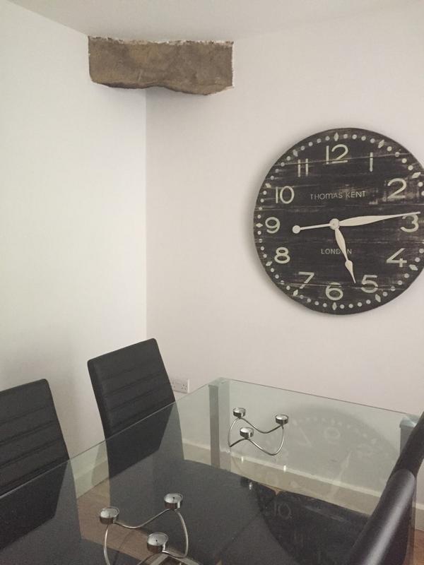 Love our stunning Thomas Kent wooden clock £175 looks great in this contemporary dining room a real statement...