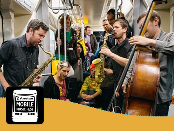 trimet's tweet photo. Check out live local bands on board @PDXStreetcar @StreetcarMusic Mobile Musicfest 10/10 #SMMF http://t.co/YZsE7AEDdB http://t.co/hKn4SCUUpQ