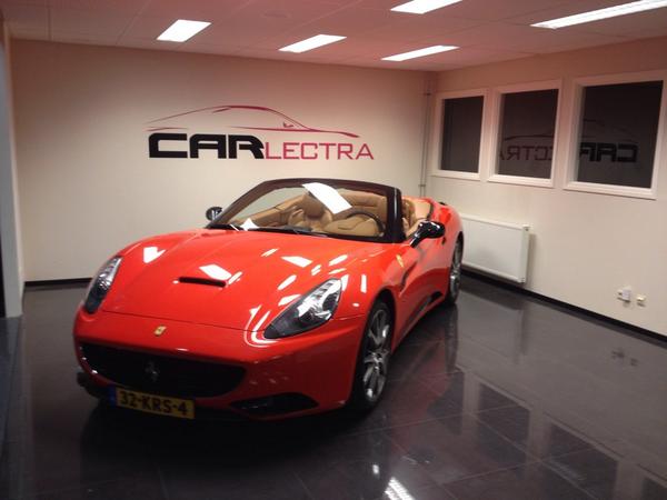 sunnyarendsen's tweet photo. FerrariCalifornia wrapproject finished From black to ferrari highgloss red @CARlectra @wrapjeauto@carphonics. http://t.co/4g0dmmigkW