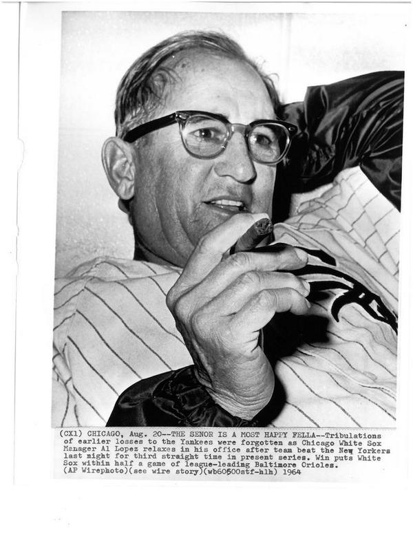 Ever the Ybor City native, Al Lopez enjoys a cigar after a win against the Yankees in 1964. #throwbackthursday #TBT