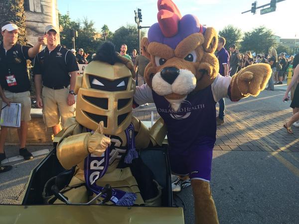 UCF_Knightro's tweet photo. Rollin with @KingstonOC from @OrlandoCitySC in the March to Victory! #ChargeOn http://t.co/SXOmfleEgq