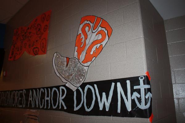 PCClipper's tweet photo. #SophomoreHallway taking Country Nights meet City Lights to a new level! Glitter boots & a bow tie! #PCHOCO14 http://t.co/6cpsaeYs7p