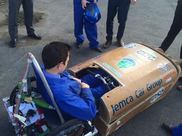 BlueFlames2014's tweet photo. @LBoughtflower getting the safety briefing before driving the car #BlueFlamesRacing http://t.co/1XHOx5ut2l