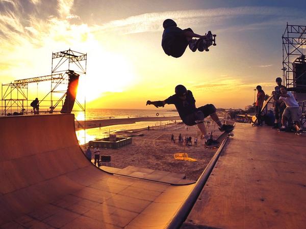 tonyhawk's tweet photo. Duck-duck Smith under @evansk8r this evening near Lisbon. I predict this beach will look much different tomorrow... http://t.co/EjTqJOCaR1