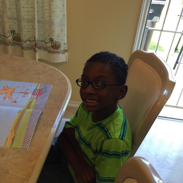 btown_sharon's tweet photo. JaCori reading to his mom! http://t.co/39d5FZJxTN