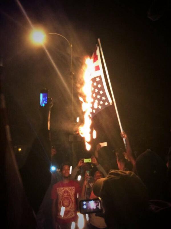 AndyBuhr's tweet photo. #FergusonTerrorists plan #FergusonOctoberTerrorism violent #HateMobs viral #Vandalism #FlagBurning "'protests" in STL http://t.co/aF4eSoWnOZ