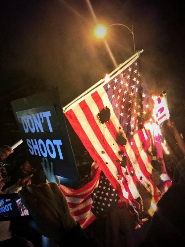 AndyBuhr's tweet photo. #FergusonTerrorists plan #FergusonOctoberTerrorism violent #HateMobs viral #Vandalism #FlagBurning "'protests" in STL http://t.co/aF4eSoWnOZ