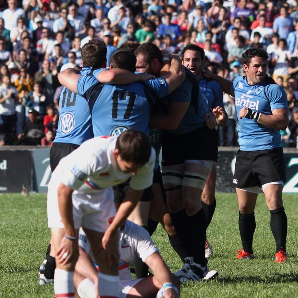 .<a href="/RugbyUruguay/">U.R.U.</a> players celebrate qualifying for #RWC2015 .They will join Pool A with England, Australia, Fiji + Wales