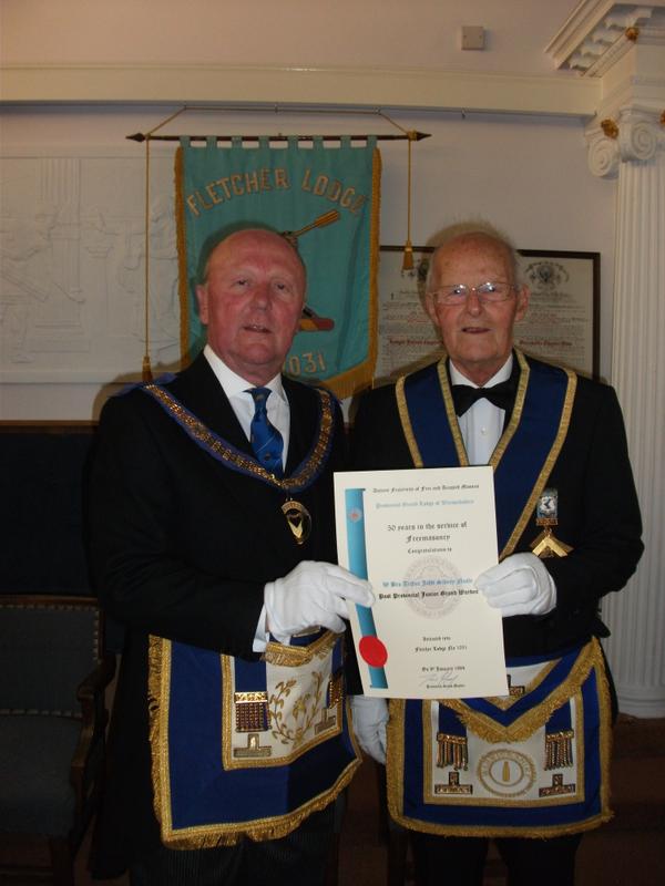Asst PGM Trevor Sturt presenting WBro AJS Neale his 50 year certificate on Wednesday night <a href="/KMCentre/">Knowle Masons</a> @WarwickshirePGL