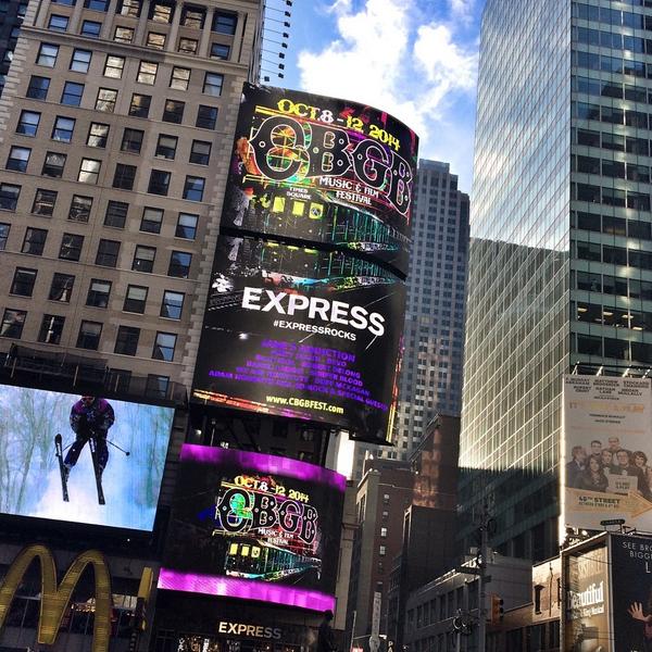 express's tweet photo. In the center of it all at #TimesSquare for the final day of #CBGB fest!
#sundayfunday #ExpressRocks @cbgbandomfug http://t.co/nYQEoHS4cm