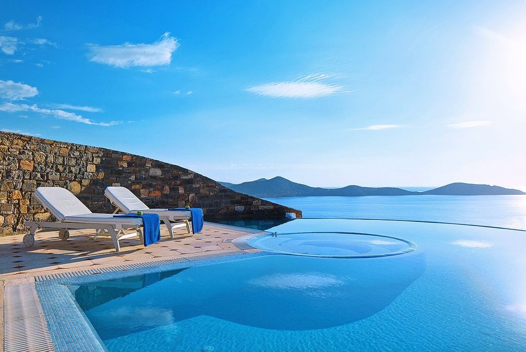 EccelentiaWorld's tweet photo. Elounda Villa &amp; Suites, Crete £999 pp. Departing Manchester 04.07 for 7 nights,  2 adults sharing a JUNIOR SUITE on a HALF BOARD basis. 🔮 https://t.co/z1THDZoKtw